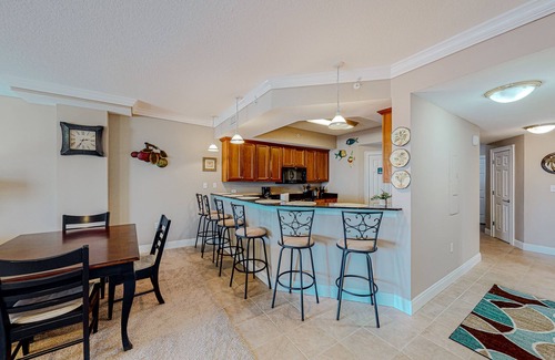 Mexico Beach Condo | Ground-floor condo with ocean view, pool/hot tub access, & private W/D