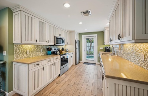 Holmes Beach Cottage | Ground Floor Cottage with 2 Master Suites and Private Heated Pool - Close to Beach!