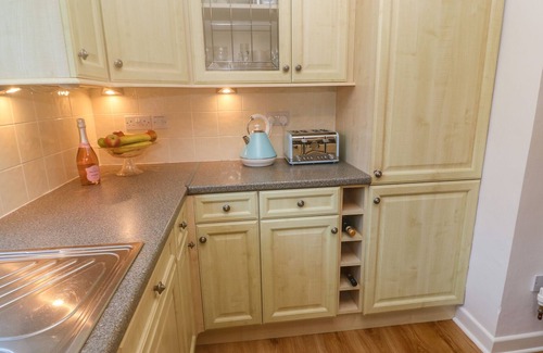 Porthcurno Apartment | GROUND FLOOR THE HAYLOFT, family friendly, with a garden in Sennen