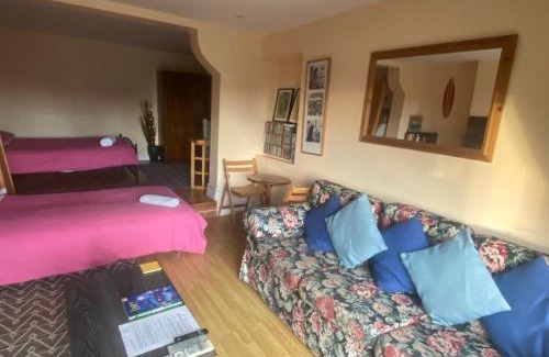 Uplands Apartment | Ground Floor - view of Lighthouse, Garden and Parking