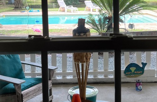 Surfside Beach Cottage | Guest Cottage overlooking the pool.