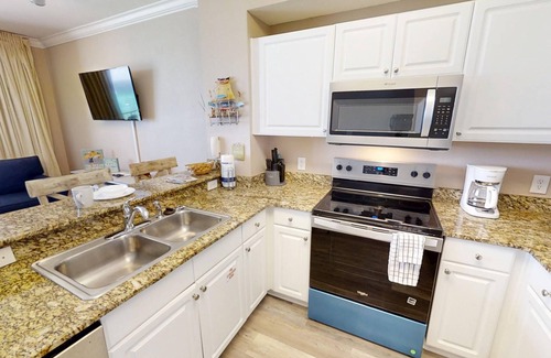 Panama City Beach Condo | Gulf Front Free Beach Service Free round of Golf & Activities Every Day