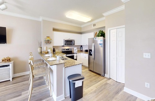 Panama City Beach Condo | Gulf Front Free Beach Service Free round of Golf & Activities Every Day
