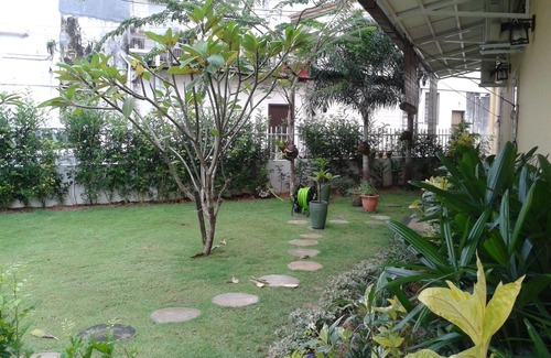 Downtown George Town House | GURNEY BNB .A unique Georgetown B&B with the most beautiful garden