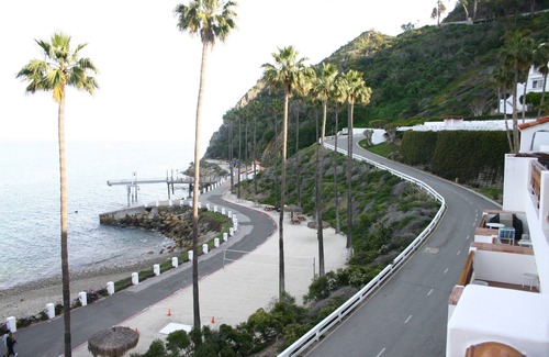 Avalon Villa | HAMCOVE BestBldg Best View/OCEANFRONT/GOLFCART/SMART TV A/C,25 yards to ocean!