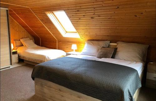 Tarjan Apartment | Hangulatos tetőtéri lakás