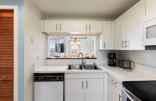 Manteo House | Happy Endings OBX: Canalfront | Shared Pool Access