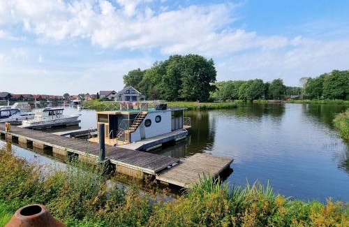 Steinbild House | Hausboot Emsblick