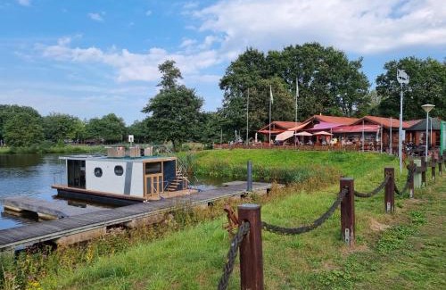 Steinbild House | Hausboot Emsblick