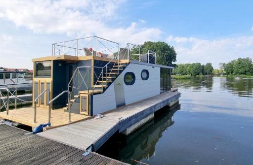 Steinbild House | Hausboot Emsblick