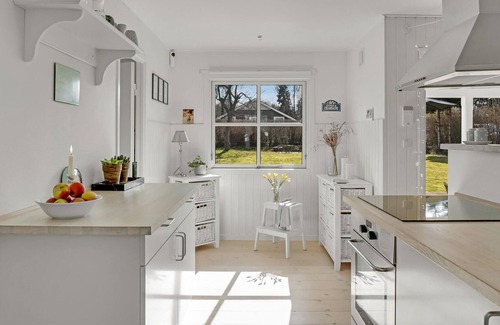 Dronningmolle House | Have a great time near the sea in this vacation home.
