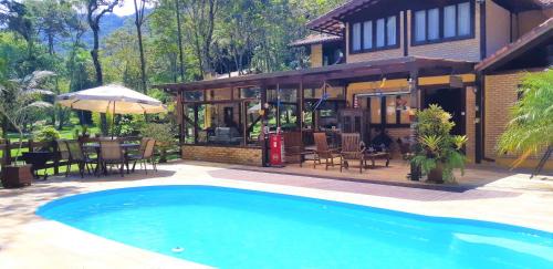 Lumiar House | Havilá Arara Azul