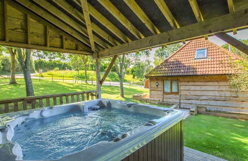 Watchet Cottage | HAZEL LODGE, pet friendly, with hot tub in Washford