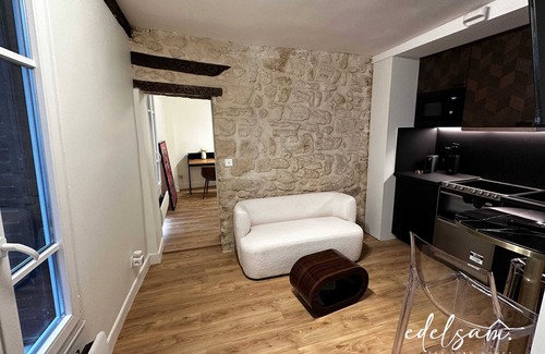 Saint-Merri Apartment | Heart Marais, lively, cozy, luxurious by Edelsam