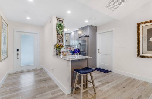 Central Naples House | Heart of Naples Home, Heated Pool, Lush Gardens, and minutes from Gulf Beaches