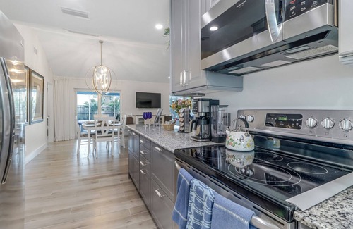 Central Naples House | Heart of Naples Home, Heated Pool, Lush Gardens, and minutes from Gulf Beaches