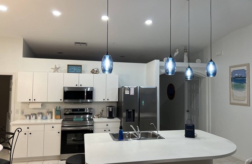 Pelican House | HEATED POOL- WATERFRONT - CANAL ACCESS - FISHING -SUNSETS - 4 BDRM 🌴