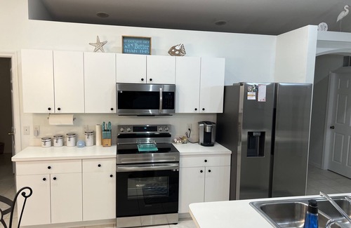 Pelican House | HEATED POOL- WATERFRONT - CANAL ACCESS - FISHING -SUNSETS - 4 BDRM 🌴