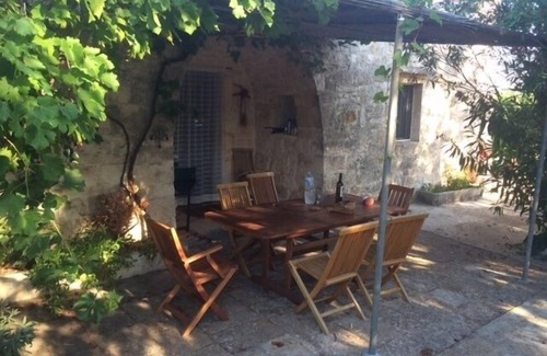 Ostuni House | Heavenly Trulli Near Martina Franca With Orchard Located In Secluded Hamlet.