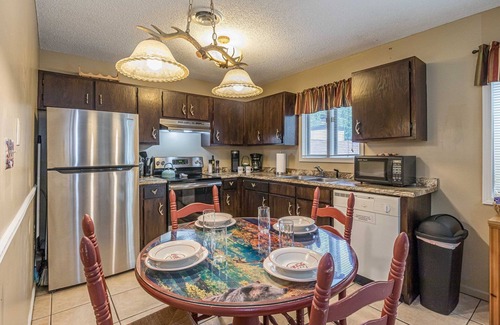 Helen Condo | Helen Riverfront 1BR 2BA Condo | Balcony Overlooking River | Downtown Helen