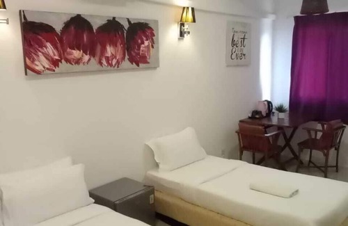 Downtown George Town Hotel | Heliconia by Treebridge
