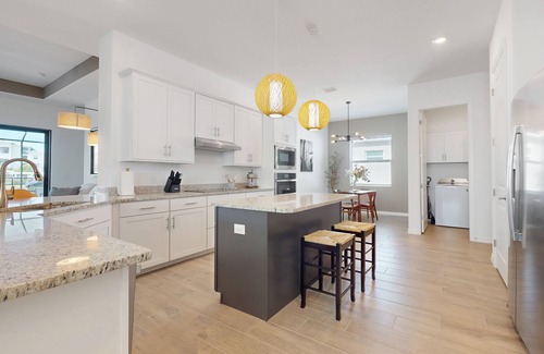 Punta Gorda House | Heritage Landing home with water views, private pool, spa, grill kitchen, & W/D