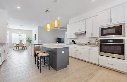 Punta Gorda House | Heritage Landing home with water views, private pool, spa, grill kitchen, & W/D