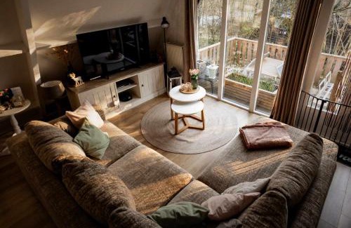 Septon Ski Chalet | Het Hertenbos Chalet 136 - Bos- Groene Oase- Rustmoment- Zwembad