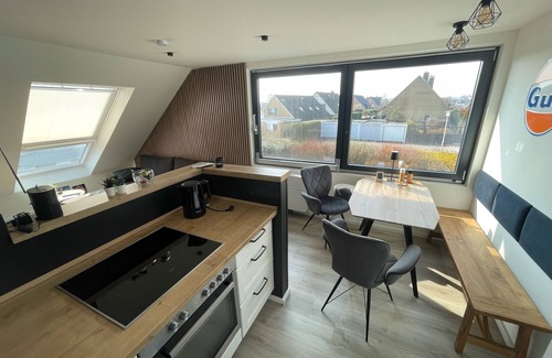 Groemitz Apartment | High-quality furnished top floor apartment completely refurbished.