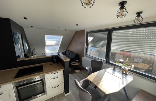Groemitz Apartment | High-quality furnished top floor apartment completely refurbished.