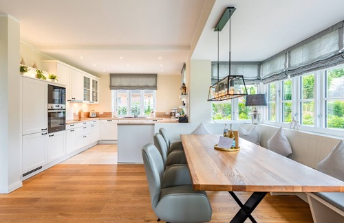 Midlum House | High-quality furnished semi-detached house with sauna, fireplace, garden and beach chair