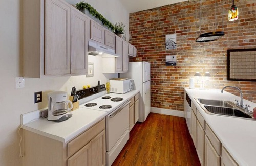Wilmington Historic District Apartment | Historic Haven on Front St – River Views & Prime Location!