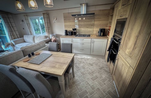 Longridge Cabin | Hobbit - House Of The Owl. Luxury lodge with views. Pet friendly. Indoor Pool.