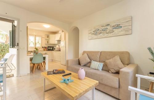 Cala Blanca Apartment | Holiday Apartment “Apartamento Delfín 1” with Pool, Terrace & WiFi; Parking Available in the Street