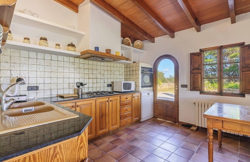 Ses Salines Apartment | Holiday Apartment "Es turo de Cabrera" with Garden, Pool & A/C