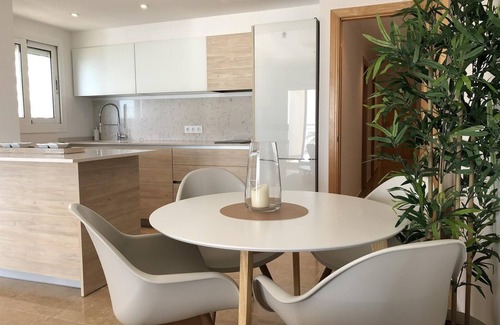 Calpe City Center Apartment | Holiday Apartment 'Front Line on the Beach' with Sea View, Pool, Garden & Wi-Fi