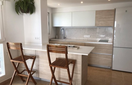Calpe City Center Apartment | Holiday Apartment 'Front Line on the Beach' with Sea View, Pool, Garden & Wi-Fi