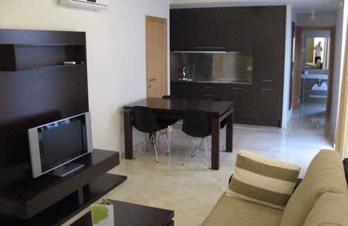 L'Escala Apartment | Holiday apartment with beautiful garden and various pools