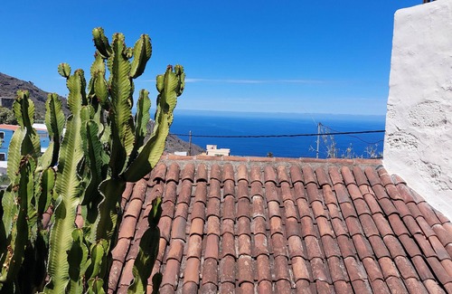 El Guincho Apartment | Holiday flat "Apartamentos Monasterio de San Antonio No. 4" with private balcony and sea view