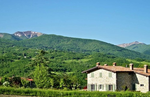 Lizzano in Belvedere House | Holiday Home in Imola with Forest & Pool