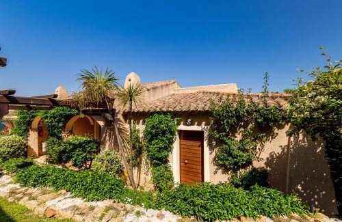 Porto San Paolo House | Holiday Home Bougainville 6 - Vista Village by Interhome