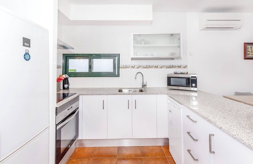 Son Xoriguer House | Holiday Home 'Cala´n Bosch 1a Planta' with Shared Pool, Shared Garden and Air Conditioning