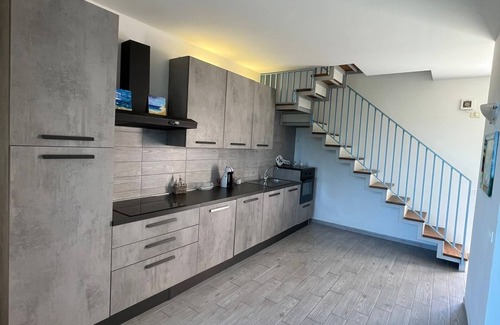 Principina a Mare House | Holiday Home 'Rio Home' with Private Terrace and Air Conditioning