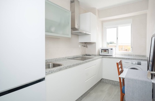 Distrito Sur House | Holiday Home 'La Oliva Well Connected' with Balcony and Air Conditioning