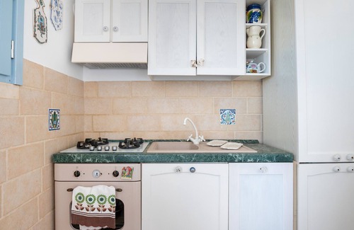 Otranto House | Holiday Home 'Le Terrazze Otranto Attico - 5' with Shared Terrace, Wi-Fi and Air Conditioning