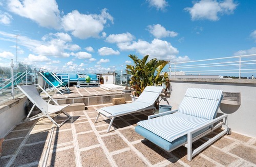 Otranto House | Holiday Home 'Le Terrazze Otranto Attico - 5' with Shared Terrace, Wi-Fi and Air Conditioning
