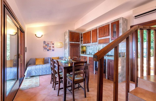 Costa Paradiso House | Holiday Home 'Luca' with Terrace, Shared Pool, Sea View and Air Conditioning