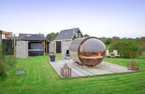 Den Burg House | Holiday home near dunes with wellness garden