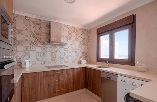 Nerja House | Holiday Home “Nerja Capistrano Villa” with Sea View, Wi-Fi, Garden, Terrace & Shared Pool