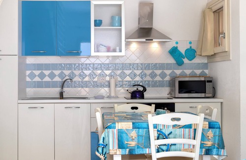 Viddalba House | Holiday Home 'Romantica Casa Al Mare' with Shared Pool, Wi-Fi and Air Conditioning